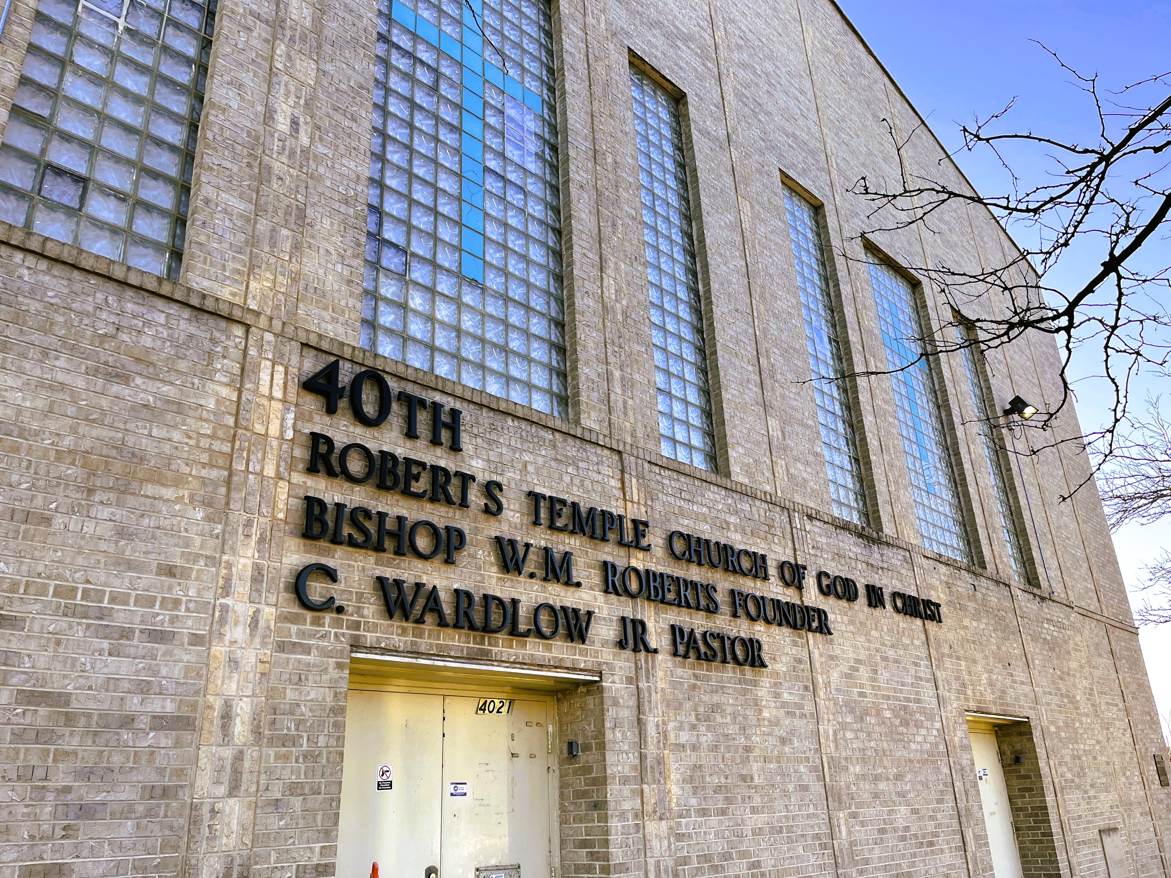 church exterior with large multi-paned windows