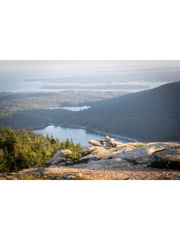 Rock cairn on an exposed granite mountain summit