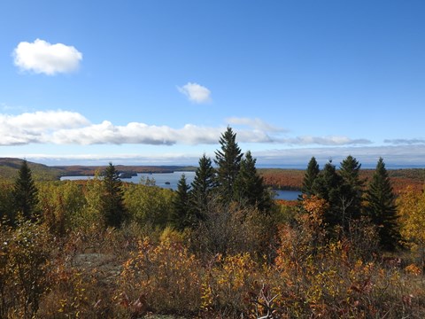 View of interior lake surrounded by forest on an island in a lake.
