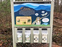large information sign and 4 brochure holders