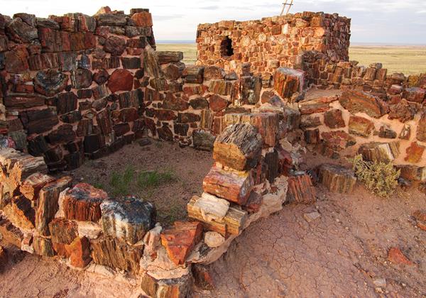 Reconstructed Ancestral Puebloan village of petrified wood pieces.