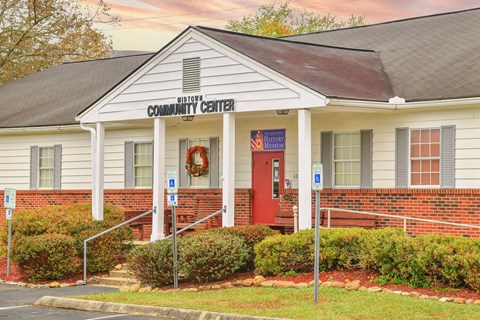 The outside of a building with the words "Midtown Community Center" above the entrance.
