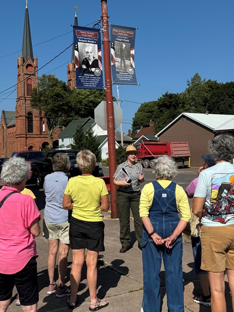 A park ranger discusses local history during a guided tour of Calumet, MI.