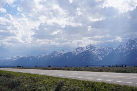 Highway with mountains in background