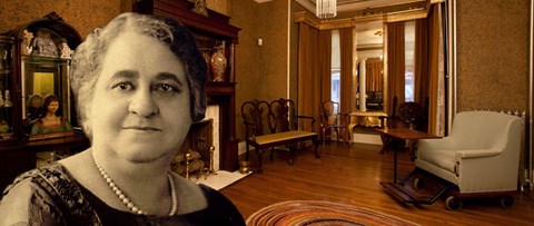 Maggie L. Walker looking forward, fireplace and chair in background