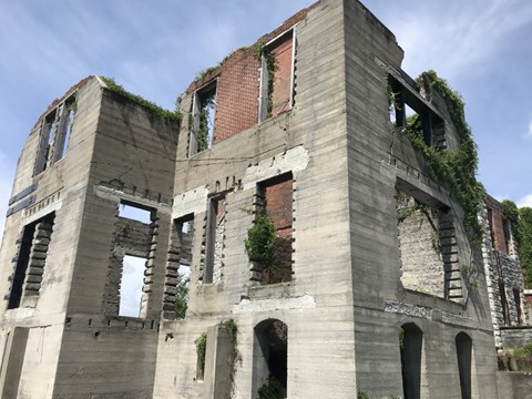 Ruins of several story Dungeness mansion with window openings in tabby and brick.