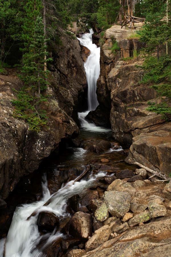 water cascading over a rocky cliff