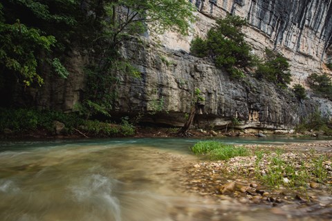 Water rushing along the base of Roark Bluff