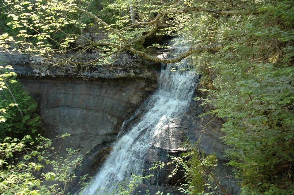 Chapel Falls flows along the angled cliff slope from top to bottom