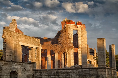 The burnt out ruins of a brick mansion