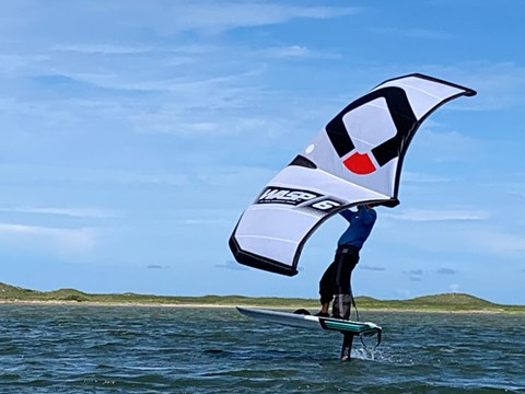A person windsurfing