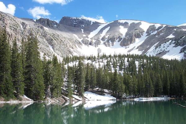Alpine lake with mountain in the background