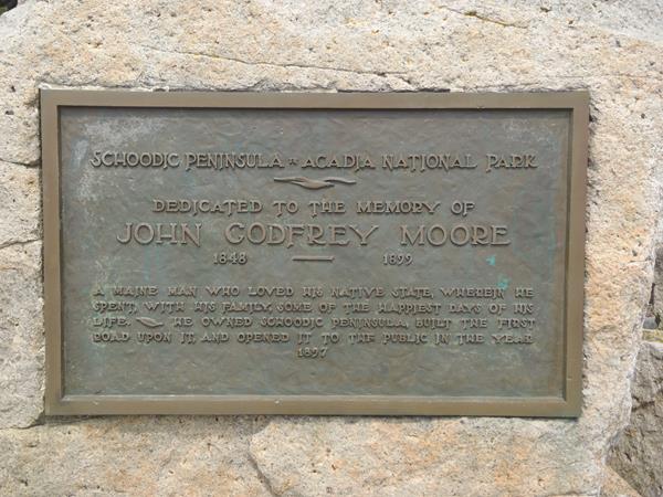 Bronze plaque on granite, inscription dedicated to John Godfrey Moore