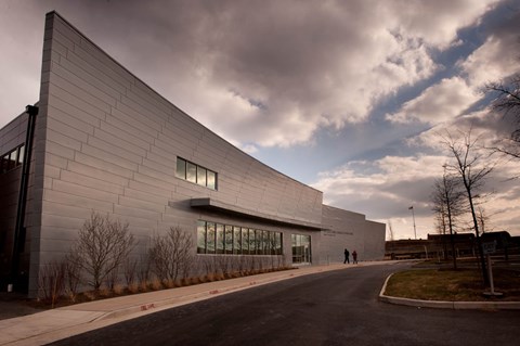 The front of the Fort McHenry visitor center on a cloudy day.