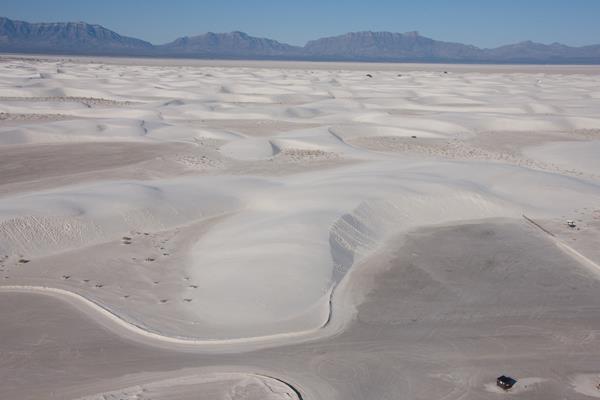 An aerial view of the Alkali Flat Trail parking lot and trailhead.