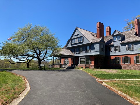 Theodore Roosevelt's Home at Sagamore Hill in bright sunshine.