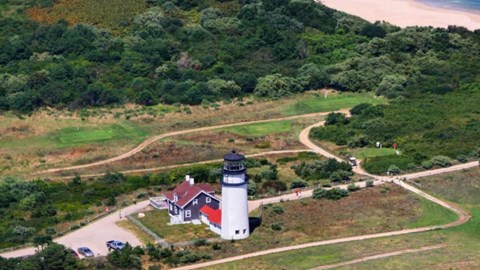 Aerial image of Highland Links Golf Course. Highland Light is surrounded by trees and green.