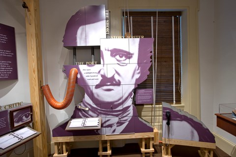 Color photo of exhibit component showing an enlarged photo of Edgar Allan Poe.