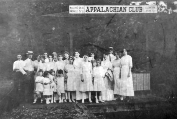 Black and white image of residents standing at the Appalachian Club Depot