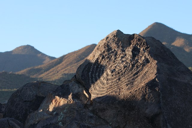 Large boulder with a large spiral etched into the stone