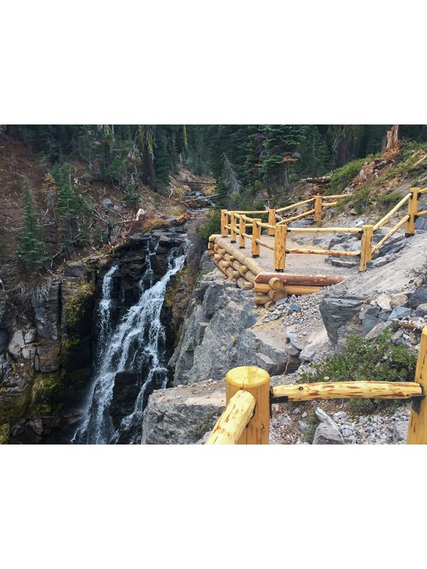 A fenced overlook above a 30-foot-high waterfall.