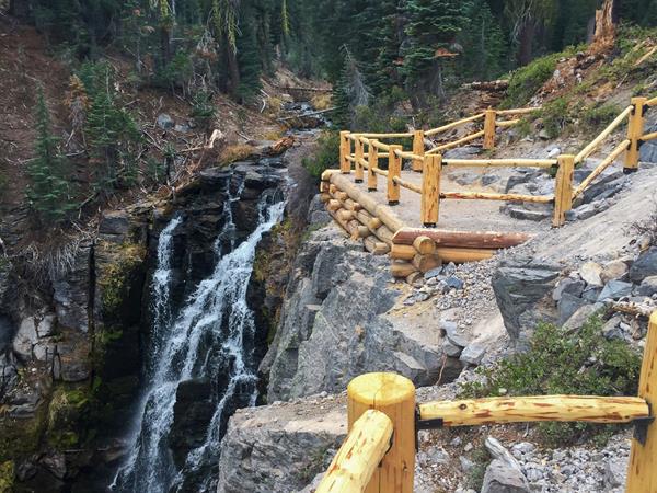A fenced overlook above a 30-foot-high waterfall.