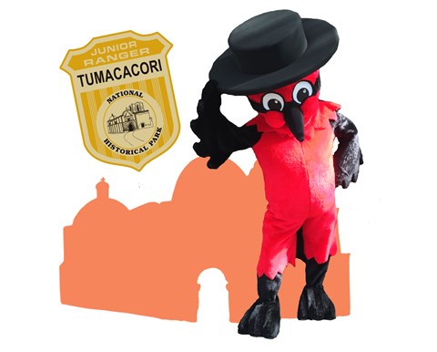 pancho the vermilion flycatcher with black hat, bowing, with silouette of church and junior ranger