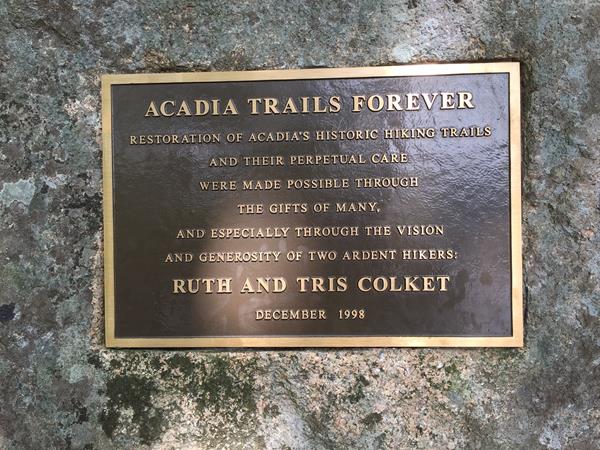 Bronze plaque on granite, inscription dedicated to Ruth and Tris Colket