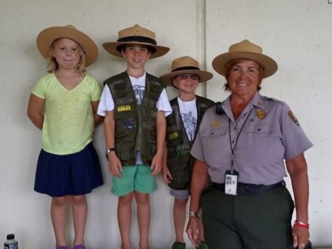 Jr Ranger and Ranger at the Pearl Harbor Visitor Center