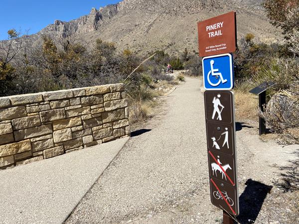 A signpost contains information about a trail