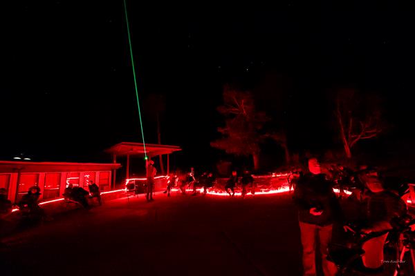 Red lit ranger program with ranger using green laser pointer.