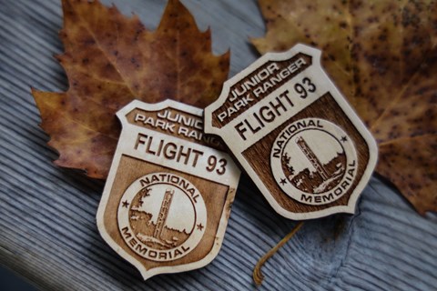 Image of two Flight 93 Junior Ranger Badges