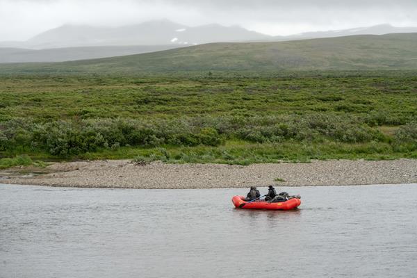 A bright raft along a river