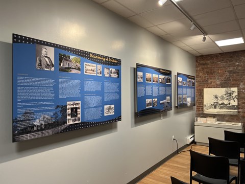 Three display panels with information about Ulysses Grant.