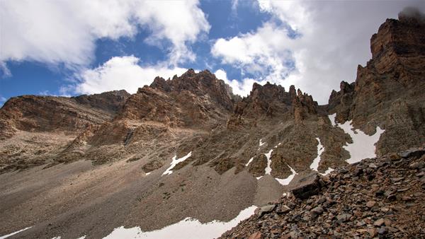 Rocky trail to the glacier surrounded with moraine