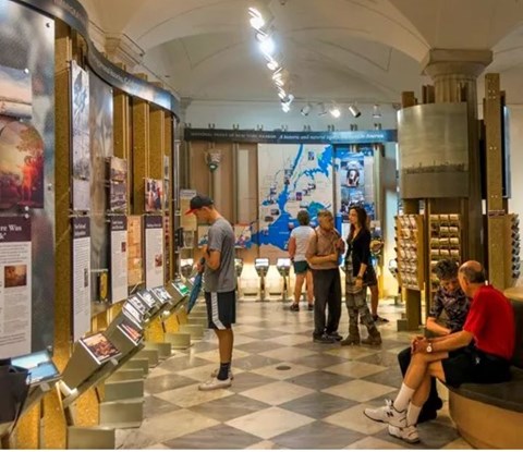 Visitors explore the Federal Hall Visitor Center
