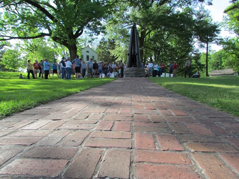 A group of people tour the national cemetery