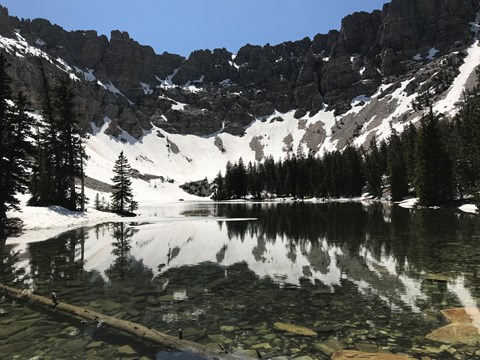 Mountain ridge partly covered in snow