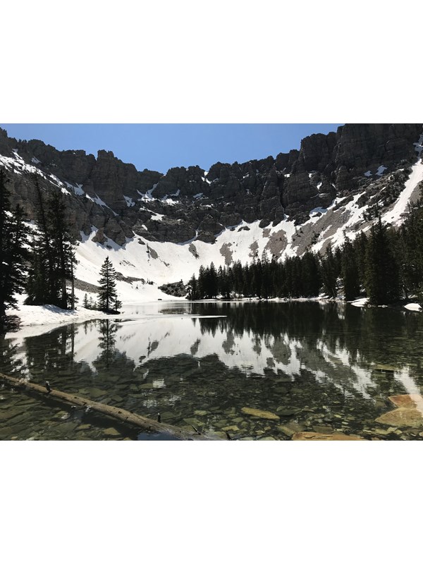Mountain ridge partly covered in snow
