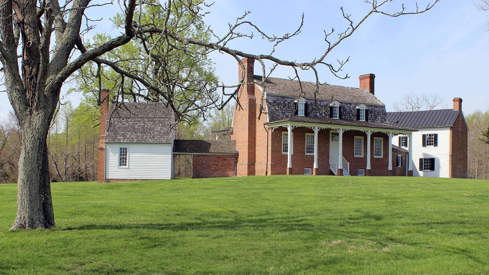 Brick house, with dormers and five different sections