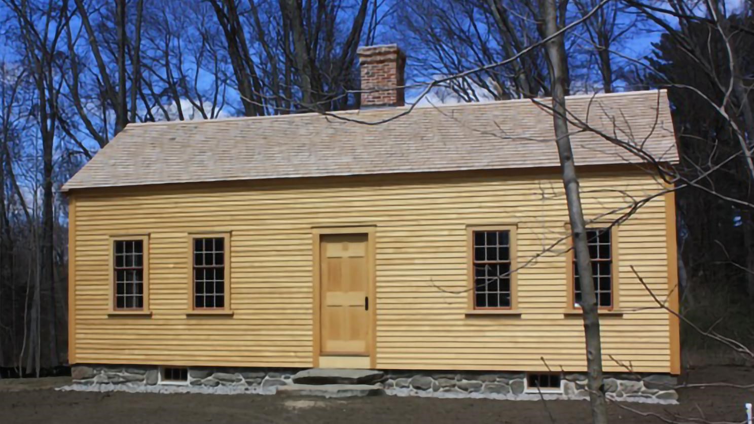 544-square-foot single story home. The outside interior of the home is yellow; 4 windows at front.