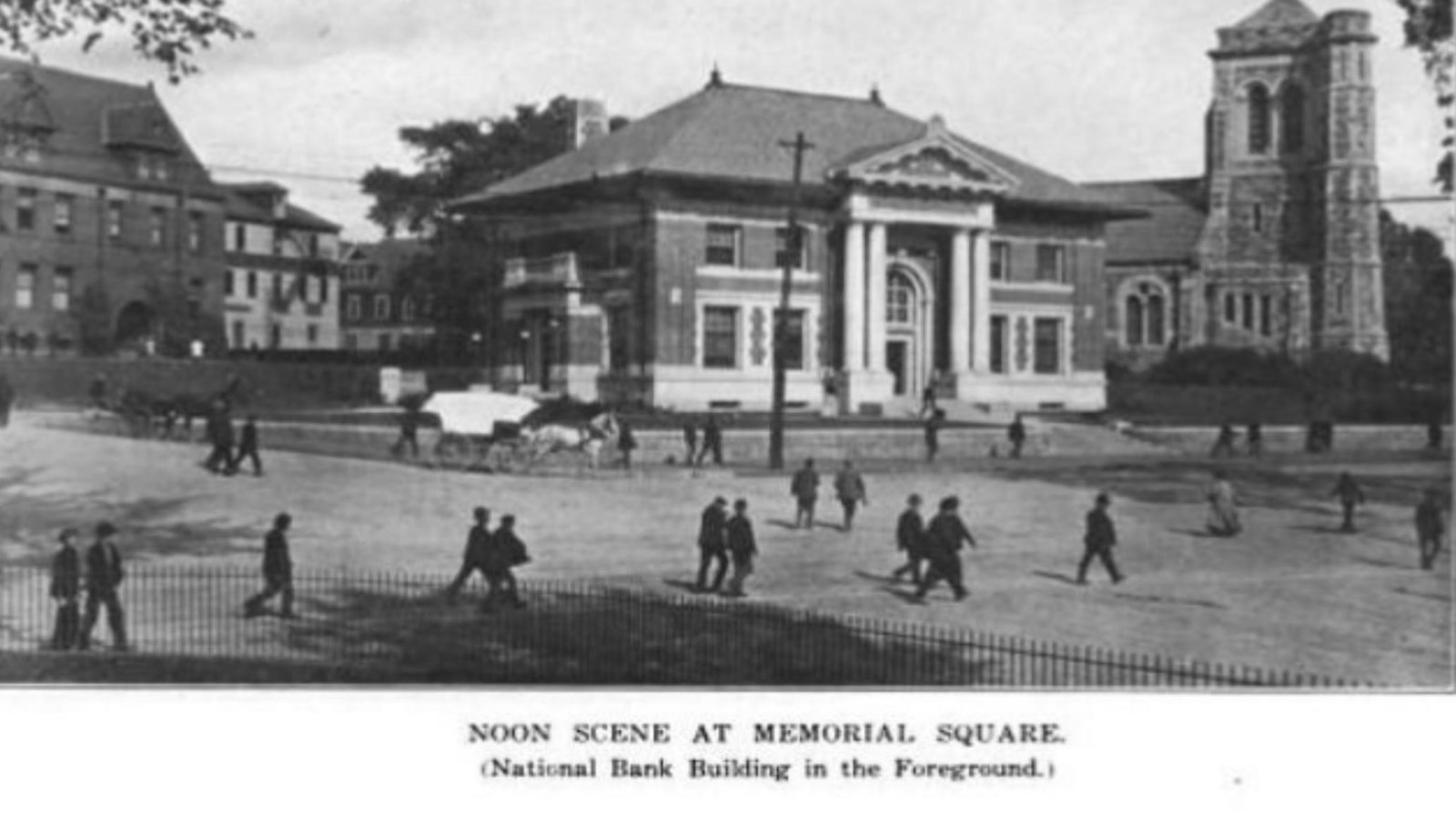 Historic image of people walking and Whitinsville National Bank in Foreground