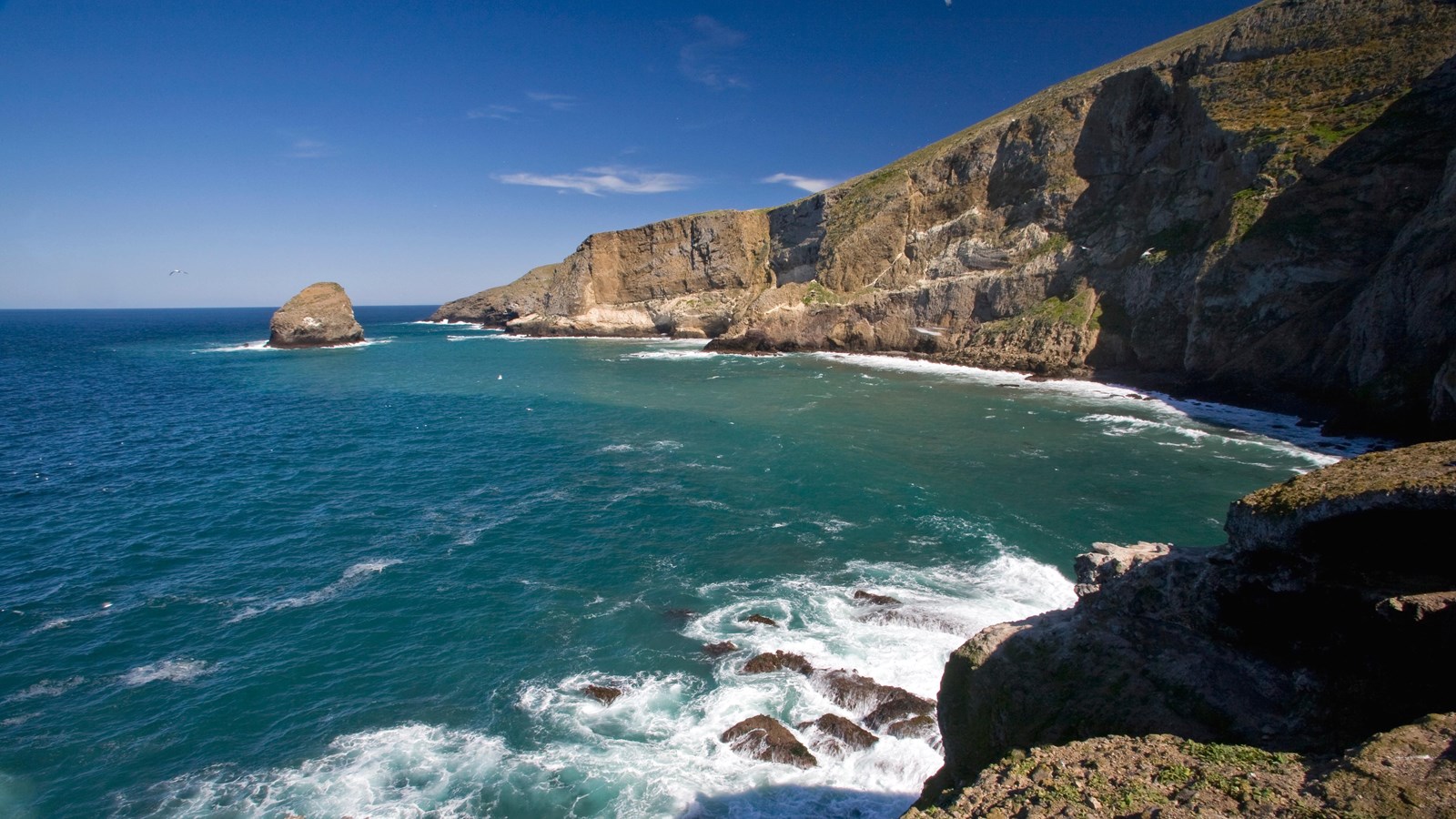 Steep cliffs along coastline.