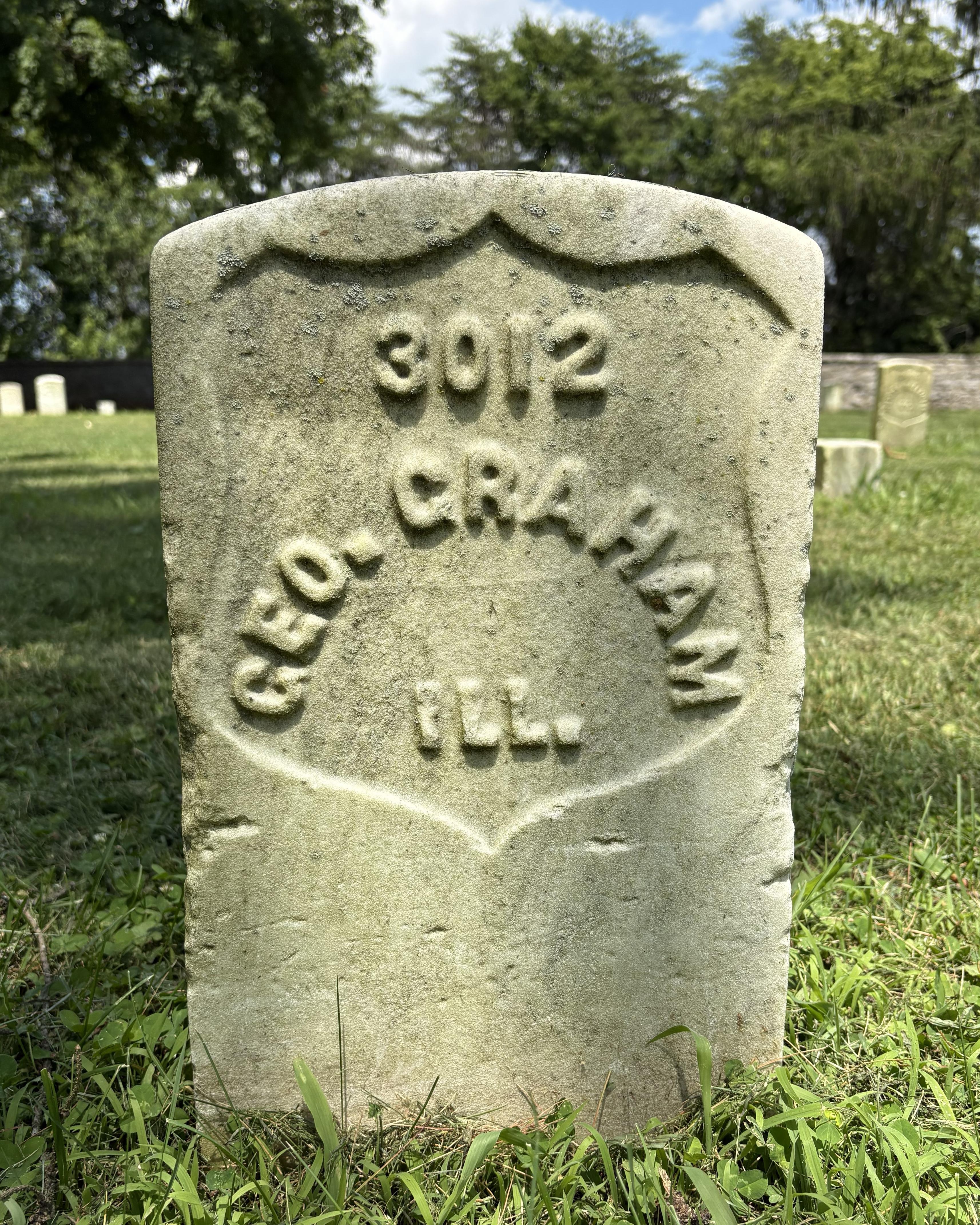 Marble headstone belonging to George Graham 