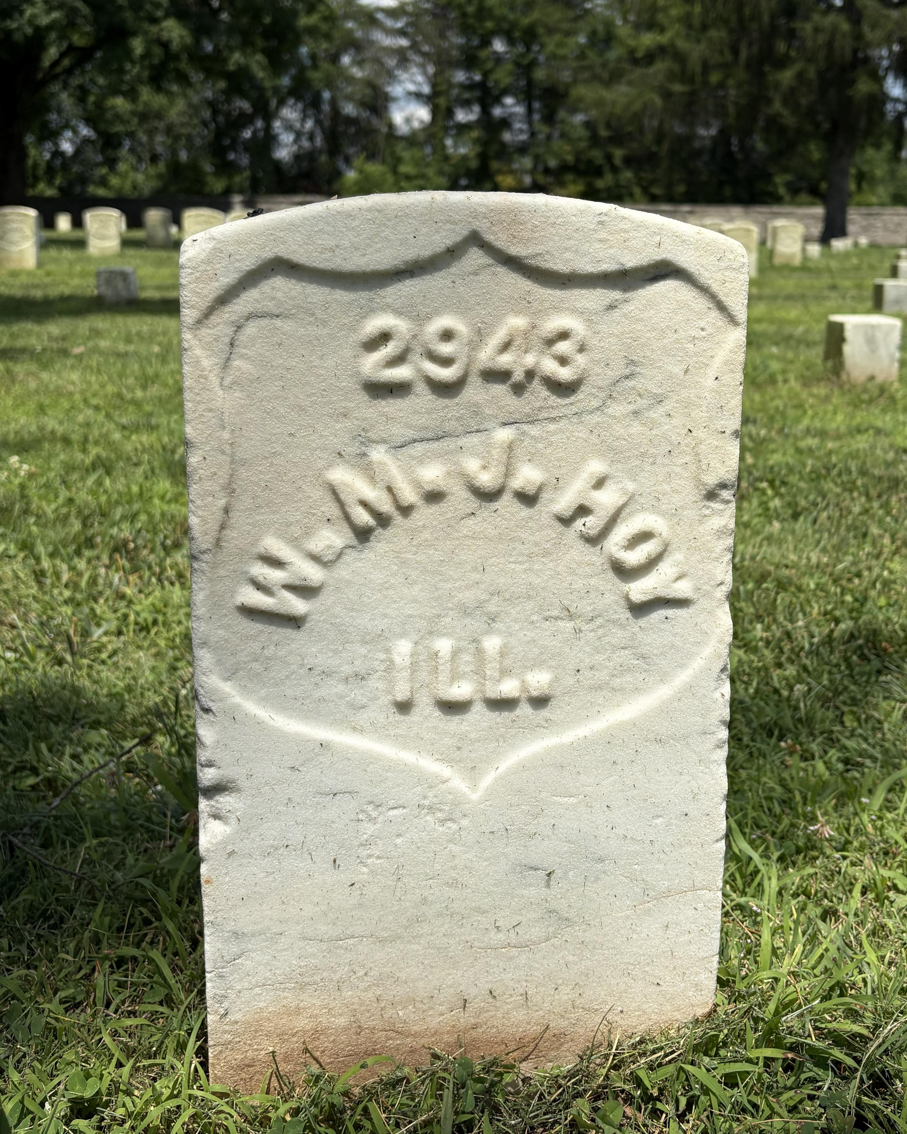 Marble headstone belonging to W.M. Hoy. 