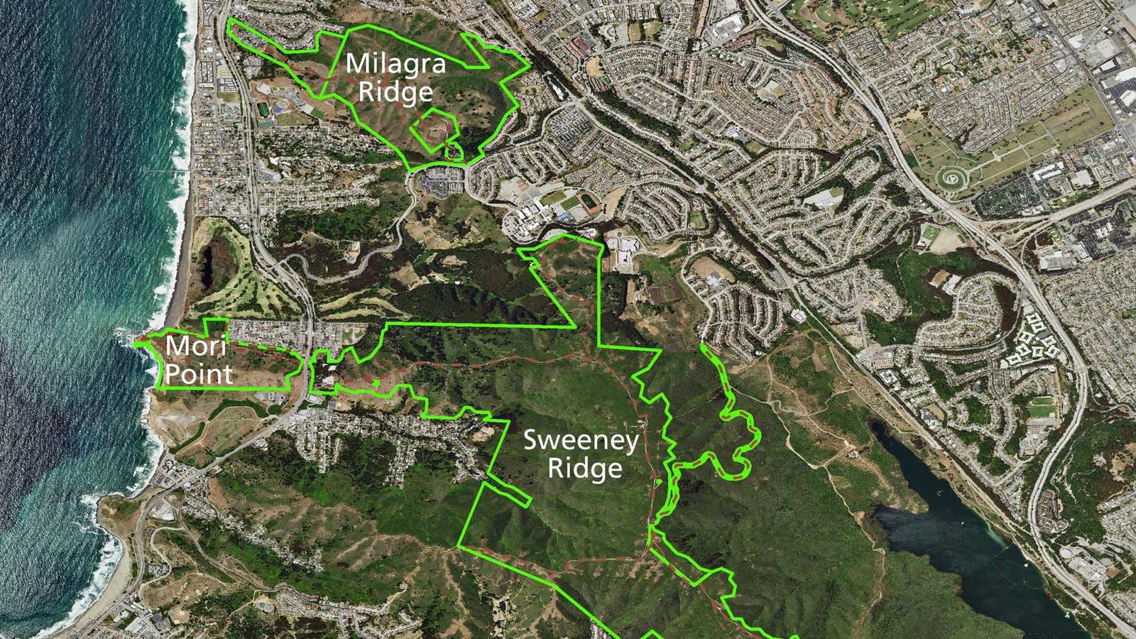 Aerial photo showing park boundaries and the open space wildlife corridors between them.