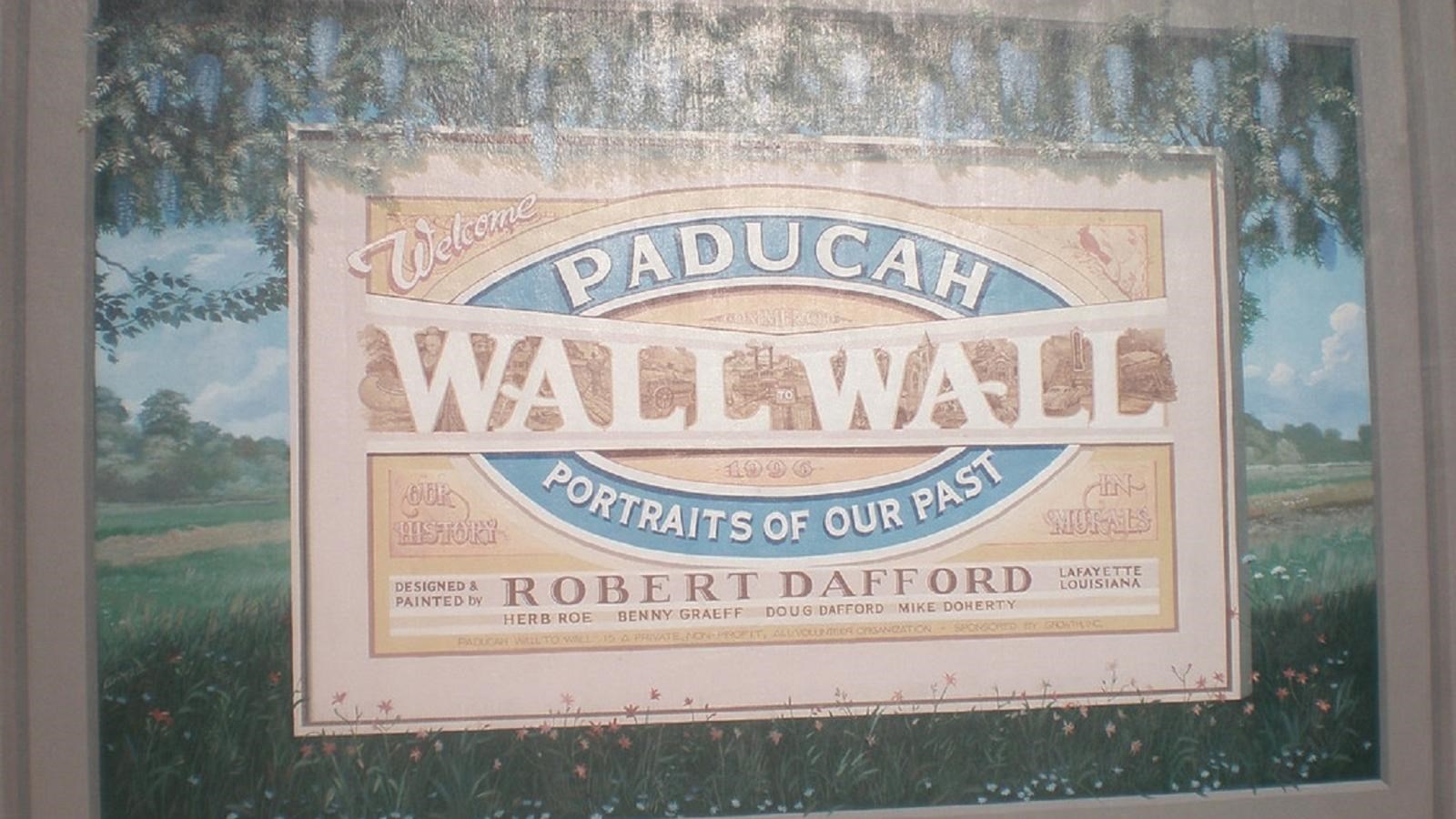 A painted mural showing a sign saying
