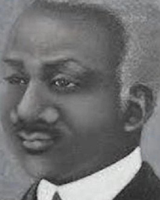 Portrait depiction of Anthony Allen in old age with grey and wearing a suit,