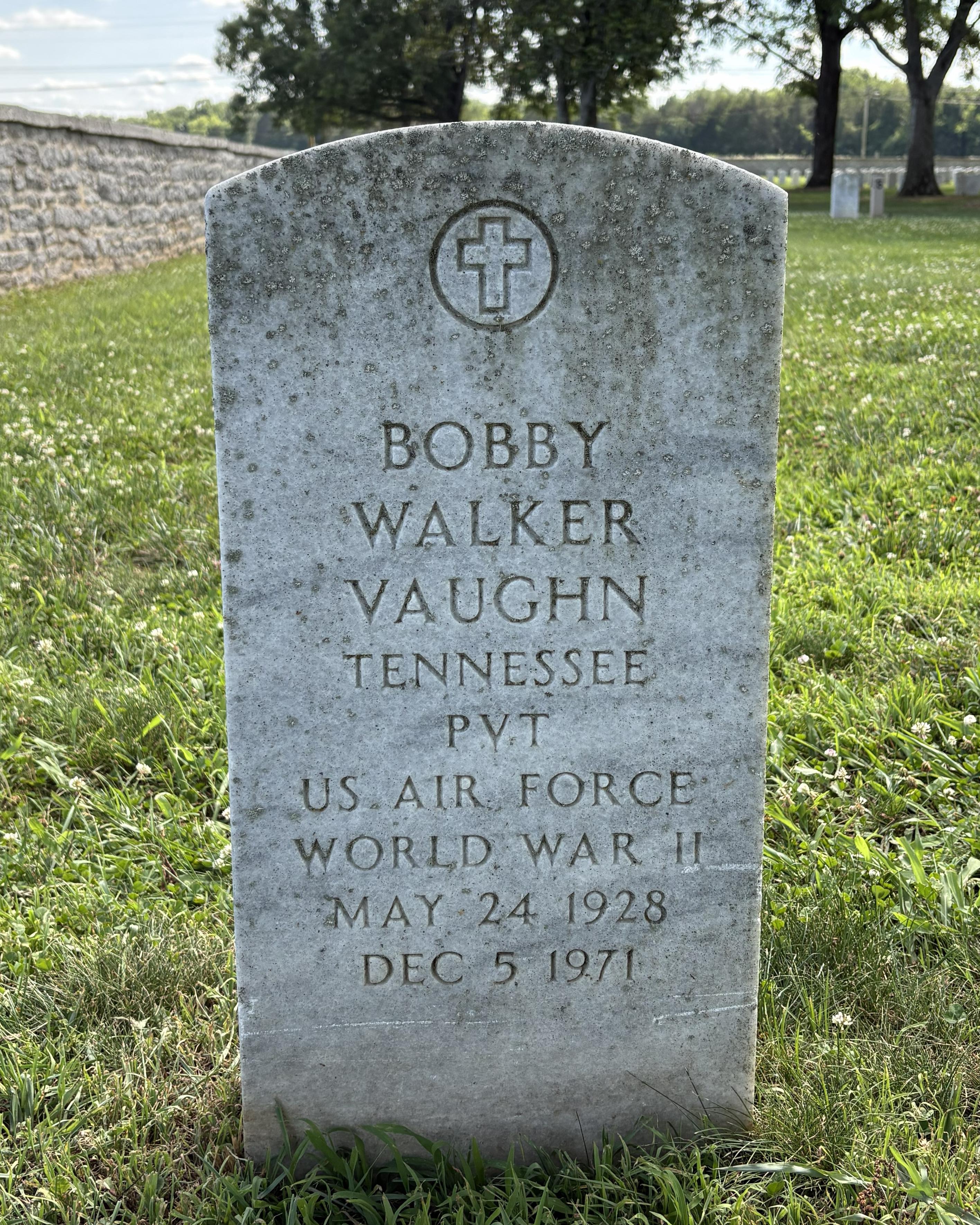Marble headstone belonging to veteran Bobby W Vaughn.