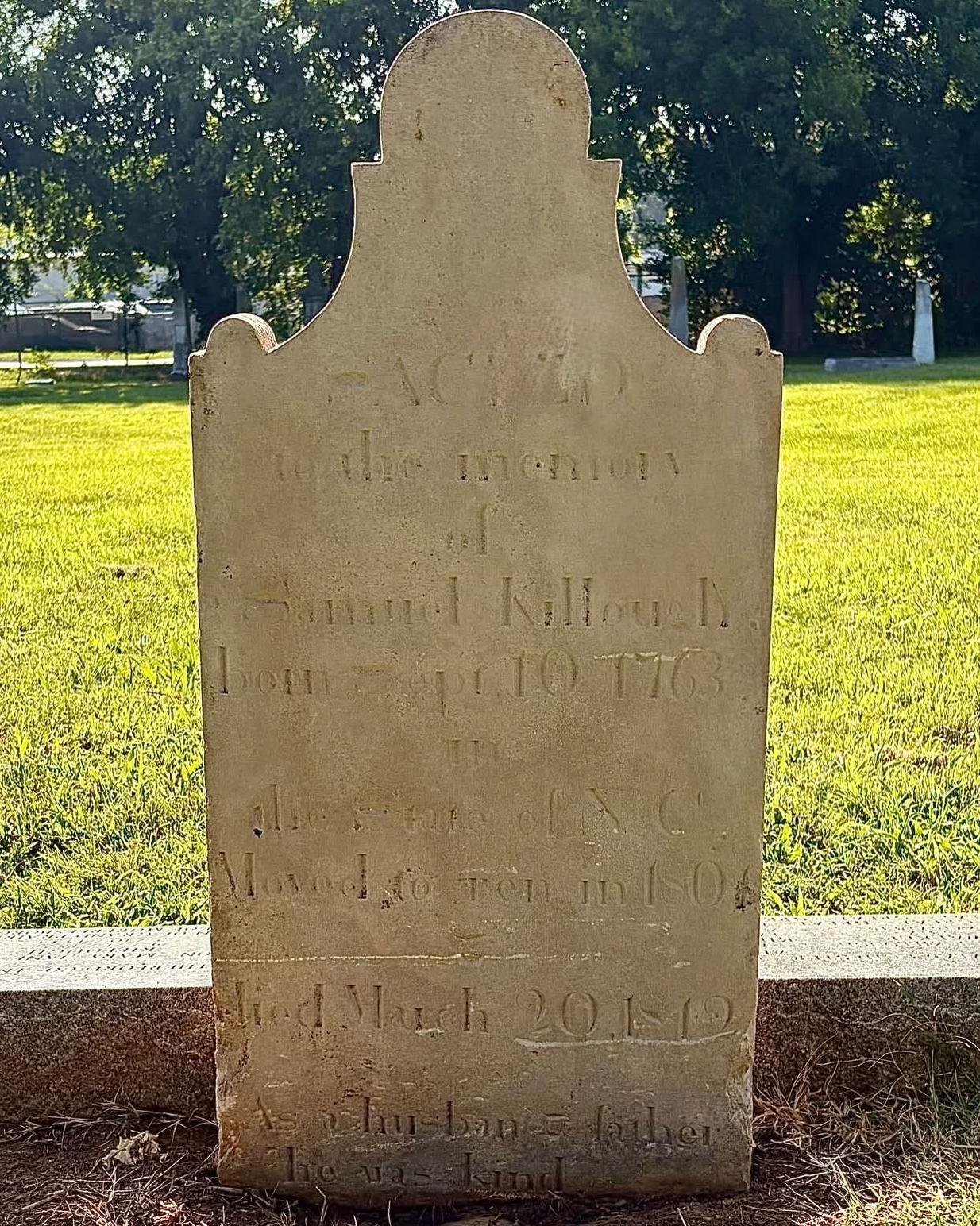 Headstone of Samuel Killough with faded inscriptions.